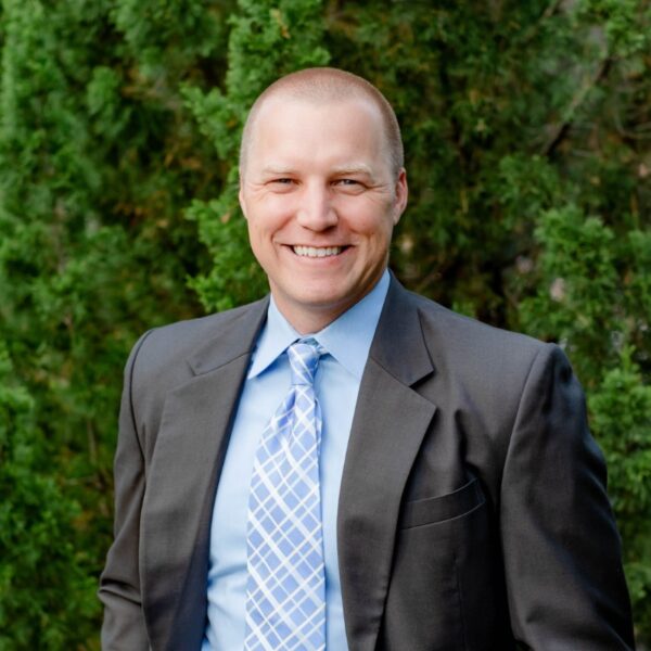 Headshot of Clayton Quamme, CFP®